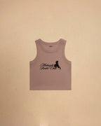Pink tank top with Midnight Rodeo Club, on a beige background