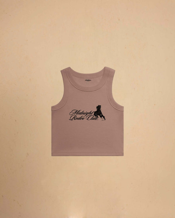 Pink tank top with Midnight Rodeo Club, on a beige background