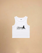 White Midnight Rodeo Club tank top on a beige background