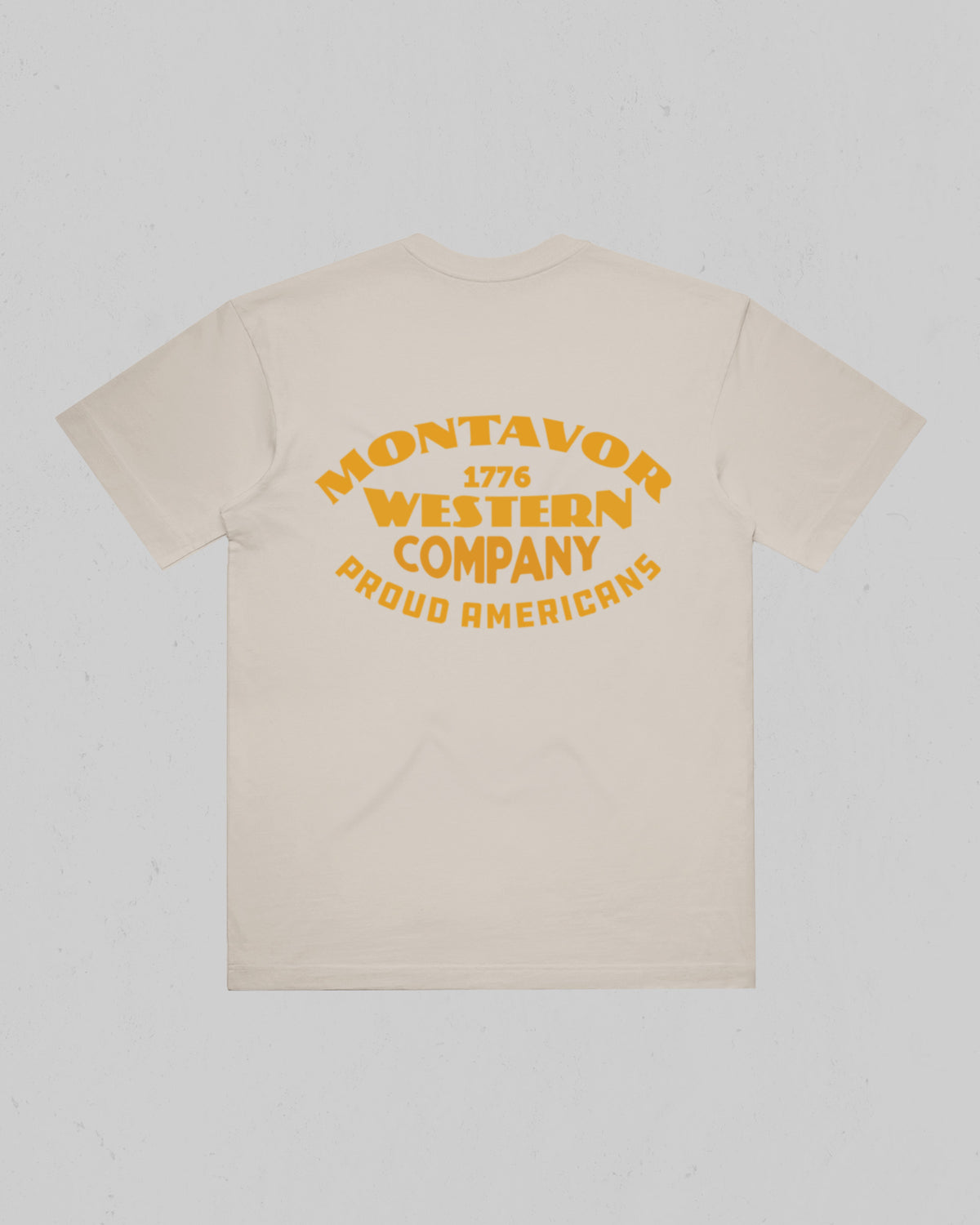 Montavor Western Company heavyweight T-shirt in Bone, back view with large Montavor 1776 Western Company Proud Americans graphic.