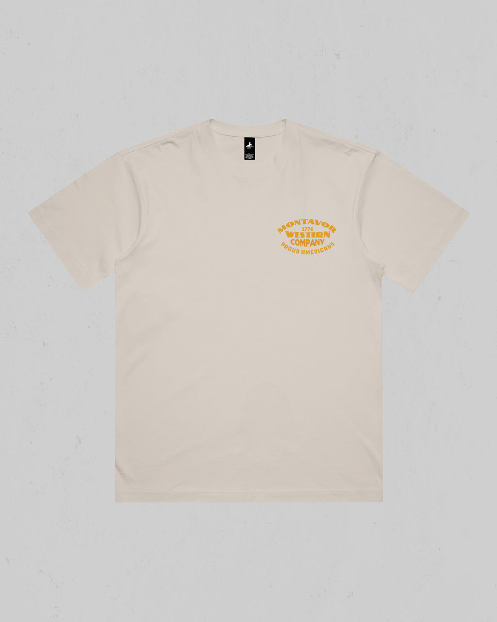 Montavor Western Company heavyweight T-shirt in Bone, front view with small left-chest typography graphic.
