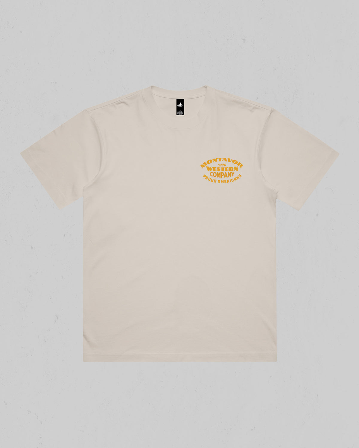 Montavor Western Company heavyweight T-shirt in Bone, front view with small left-chest typography graphic.