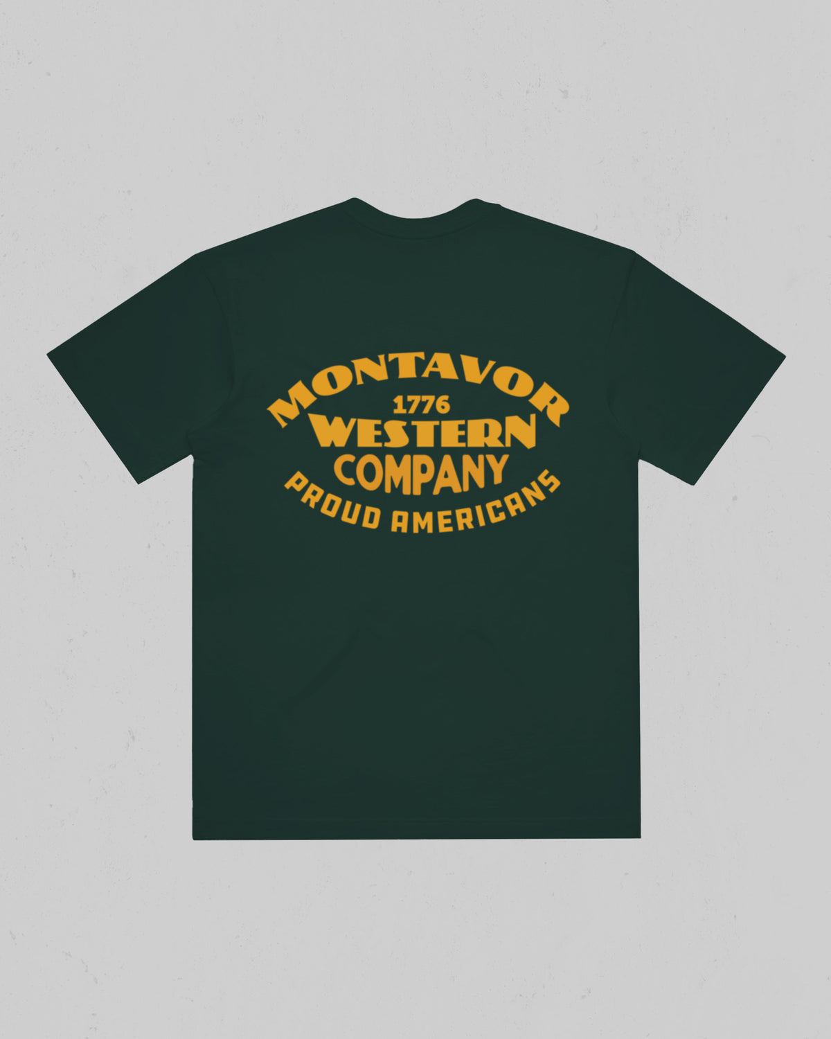 Montavor Western Company heavyweight T-shirt in Pine Green, back view with large Montavor 1776 Western Company Proud Americans graphic.