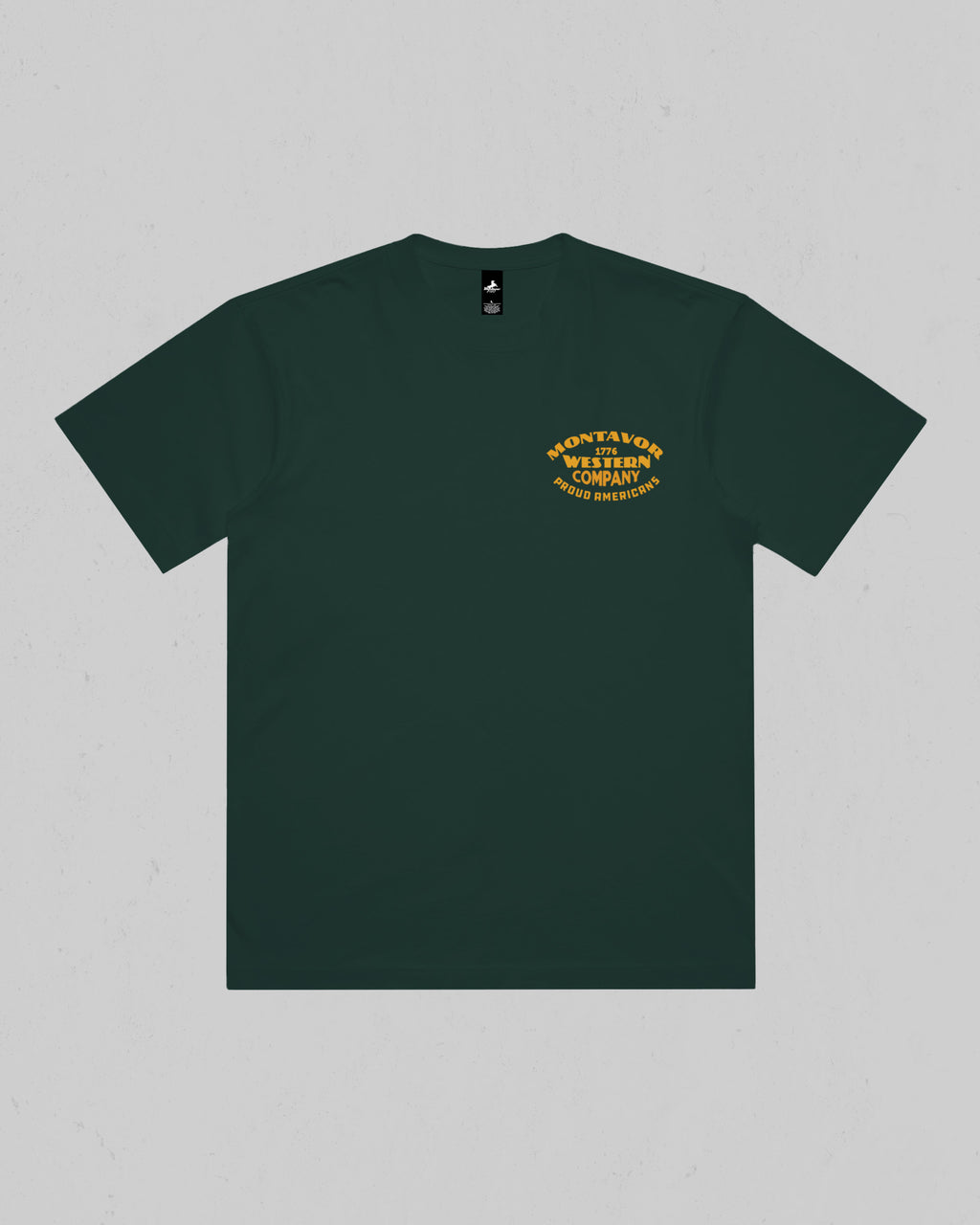 Montavor Western Company heavyweight T-shirt in Pine Green, front view with small left-chest typography graphic.