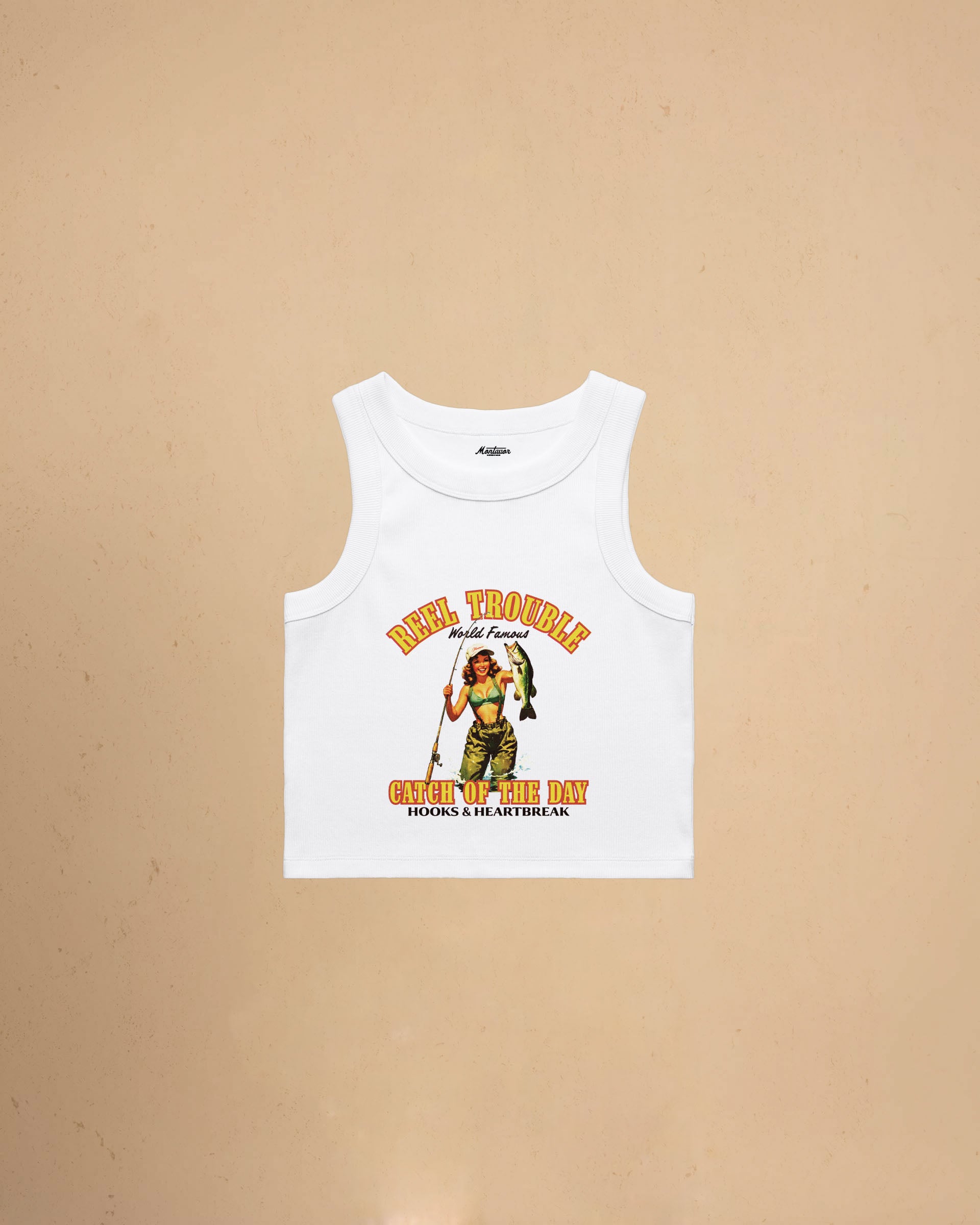 Women’s Reel Trouble organic crop tank featuring a vintage fishing pin-up graphic with retro western styling and heavyweight ribbed cotton construction.