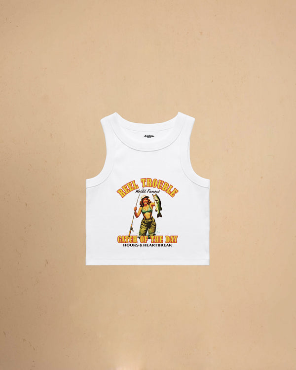 Women’s Reel Trouble organic crop tank featuring a vintage fishing pin-up graphic with retro western styling and heavyweight ribbed cotton construction.