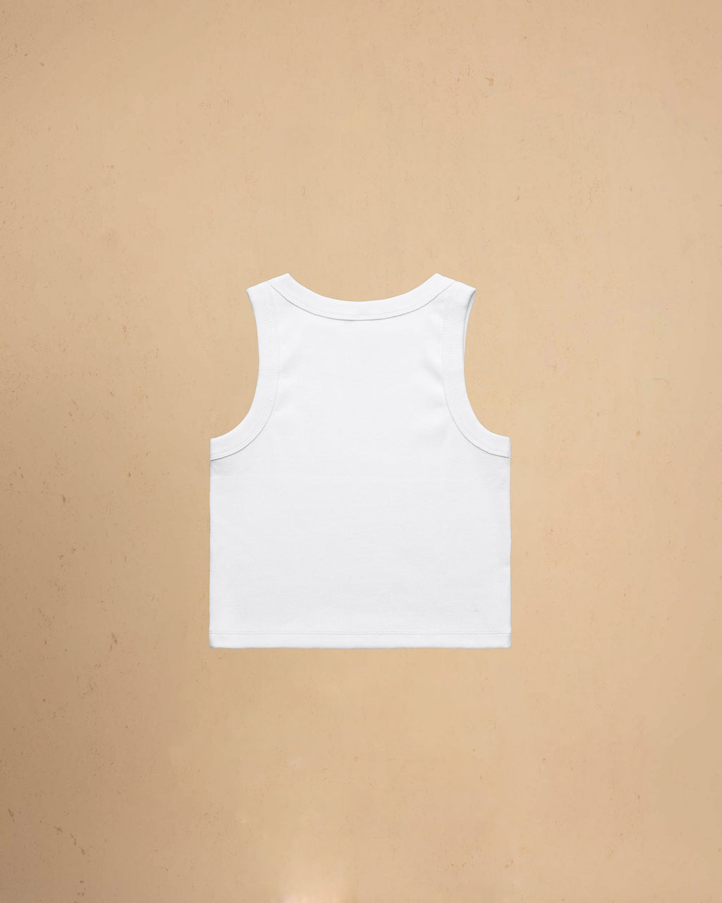White tank top on a beige background