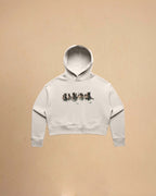 Women’s cropped western hoodie featuring minimalist wild horse artwork on premium fleece fabric by Montavor.