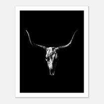 Black and white photograph of a longhorn skull with wide sweeping horns centered against a dark background, western wall art poster.