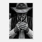 Black and white portrait of a cowboy lighting a cigarette wearing a hat, western wall art.