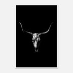 Black and white photograph of a longhorn skull with wide sweeping horns centered against a dark background, western wall art poster.