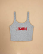 Fitted western-inspired strap tank top featuring mirrored “Cowgirl” typography on the front with a soft micro rib silhouette.