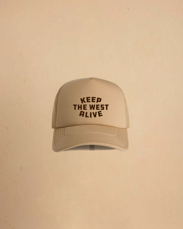 High-profile trucker cap featuring “Keep The West Alive” western typography on the front with mesh back and curved peak.