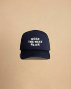 High-profile trucker cap featuring “Keep The West Alive” western typography on the front with mesh back and curved peak.