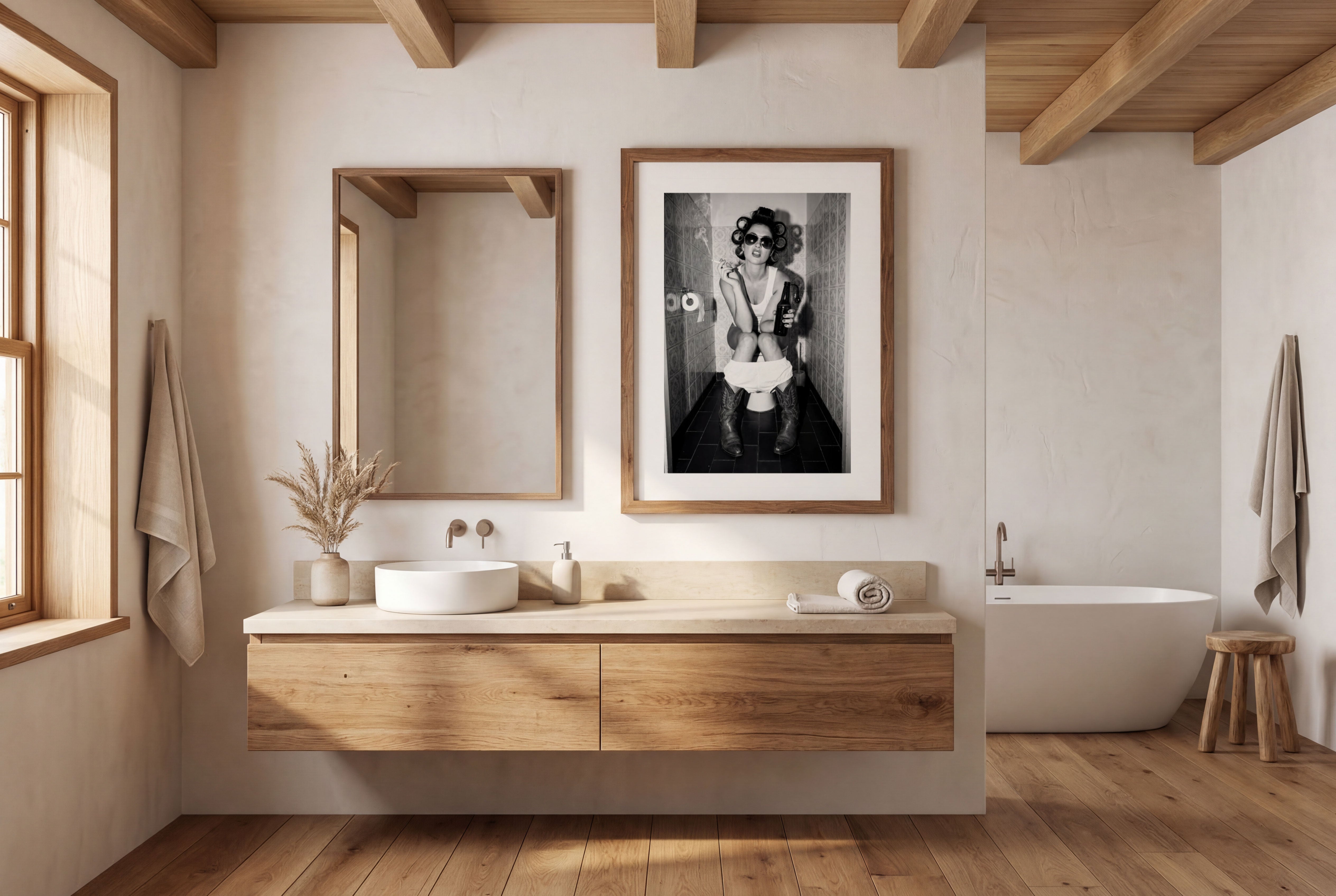 Black and white photograph of a rebellious cowgirl wearing cowboy boots and sunglasses sitting in a tiled restroom holding a cigarette and beer. Main image