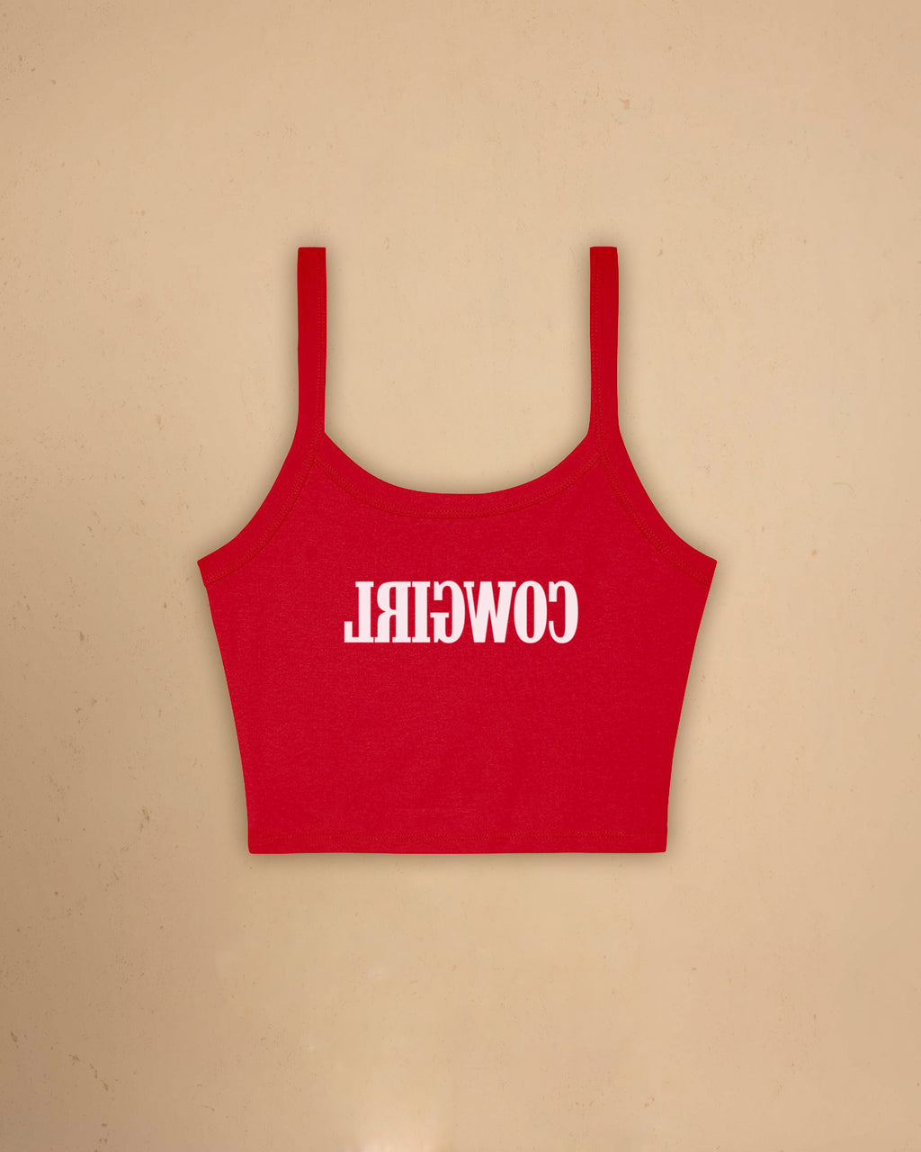 Fitted western-inspired strap tank top featuring mirrored “Cowgirl” typography on the front with a soft micro rib silhouette.