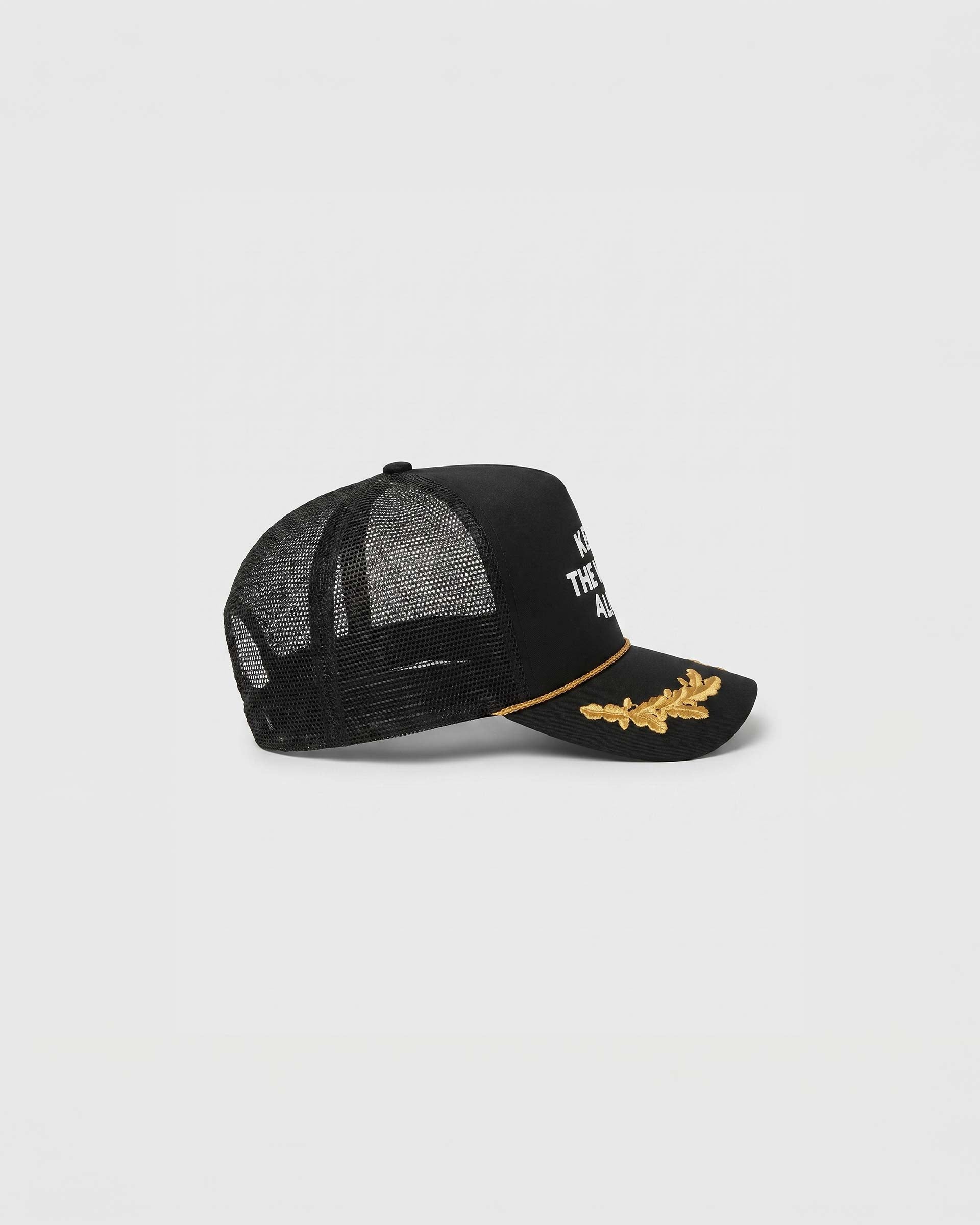 Black trucker cap on a white background