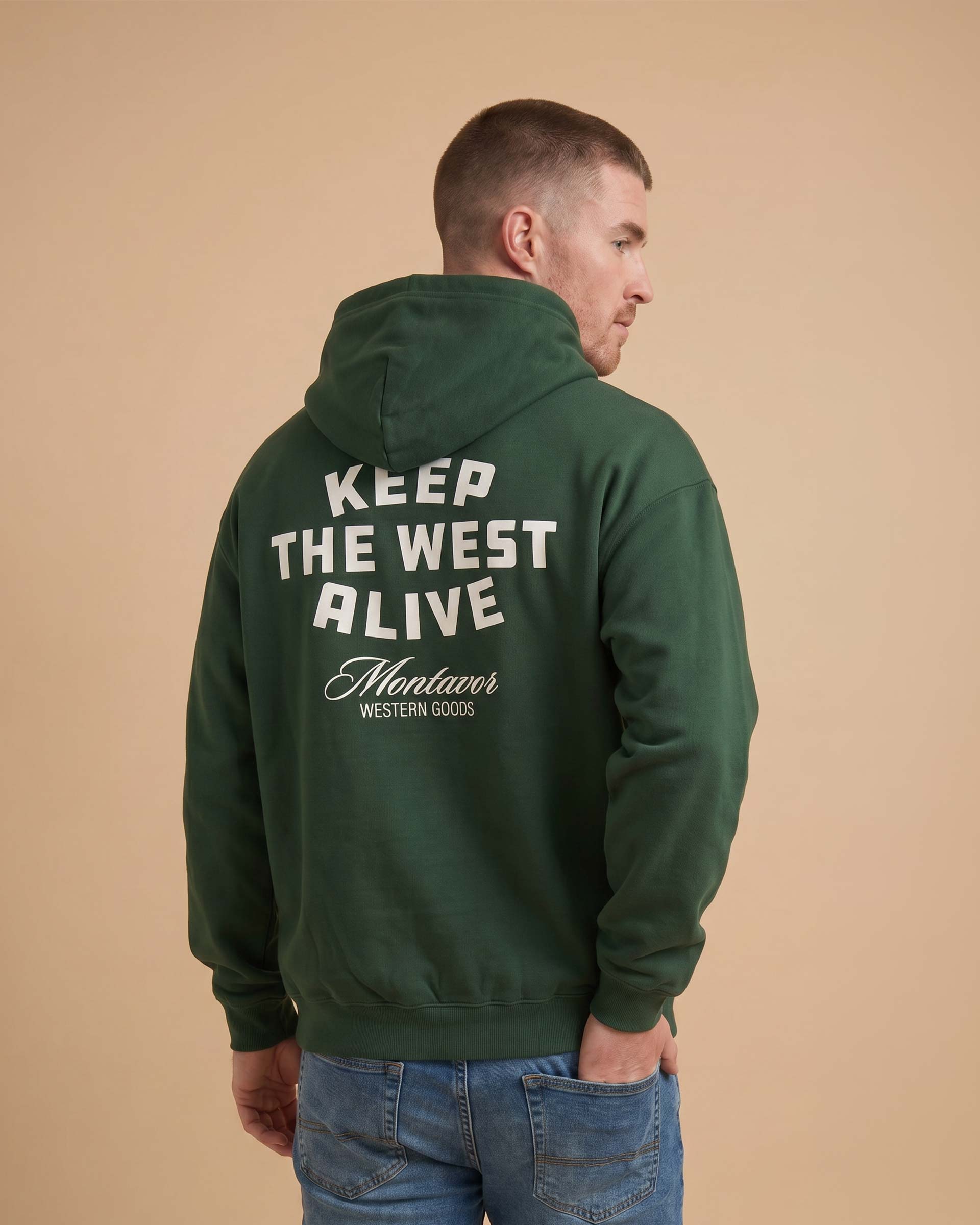 Back view of Montavor Keep The West Alive western hoodie with oversized western graphic print and relaxed fit design on a man. Main image