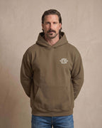 Front view of Montavor Keep The West Alive western hoodie with oversized western graphic print and relaxed fit design.
