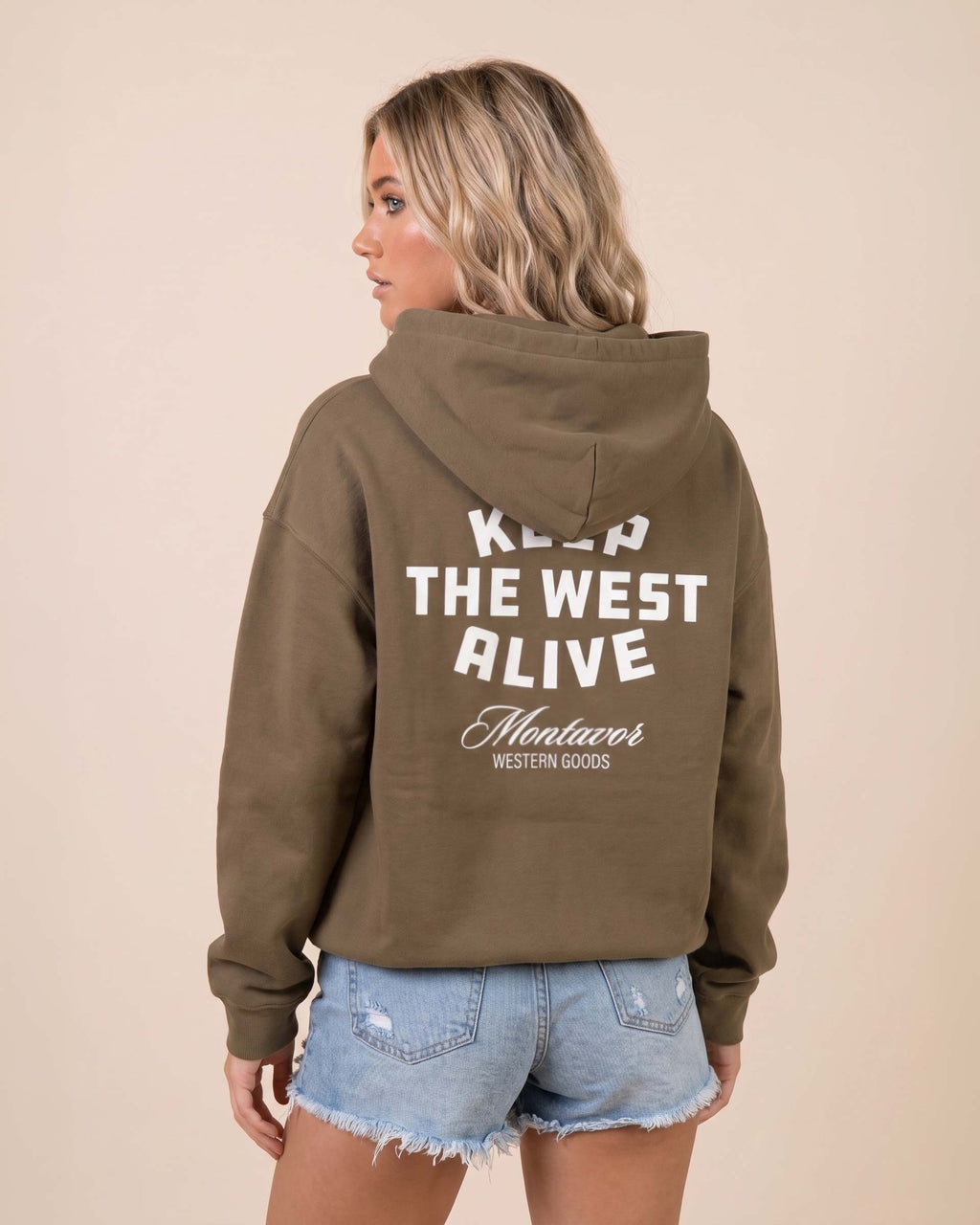 Back view of Montavor Keep The West Alive western hoodie with oversized western graphic print and relaxed fit design.