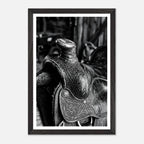 Black and white close up of a western saddle with worn leather and detailed craftsmanship, ranch wall art.