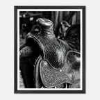 Black and white close up of a western saddle with worn leather and detailed craftsmanship, ranch wall art.